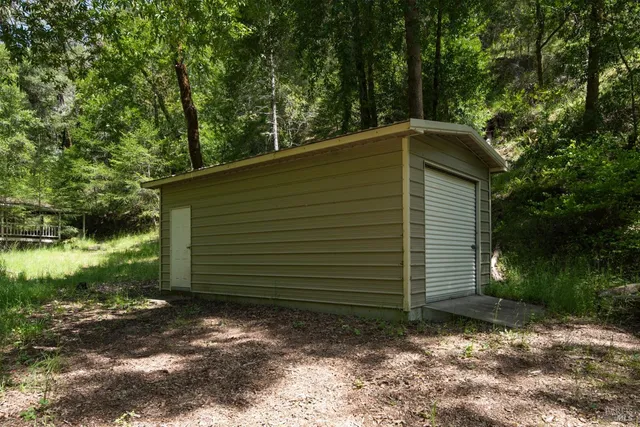 a view of swimming pool with a yard