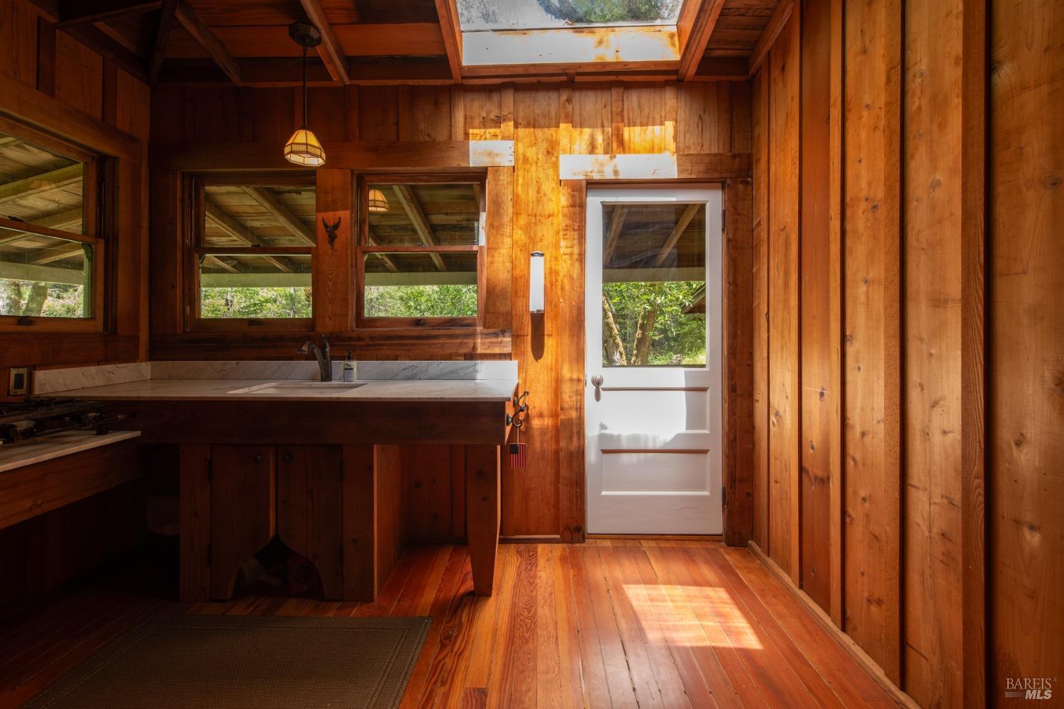 16300-16333 Yerba Santa Road Geyserville, CA 95441 - Photo 28 of 35 a kitchen with a sink and a window