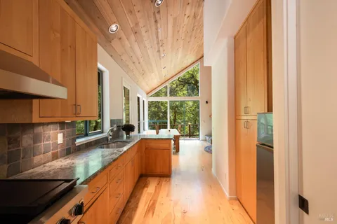 a view of a living room with a large window