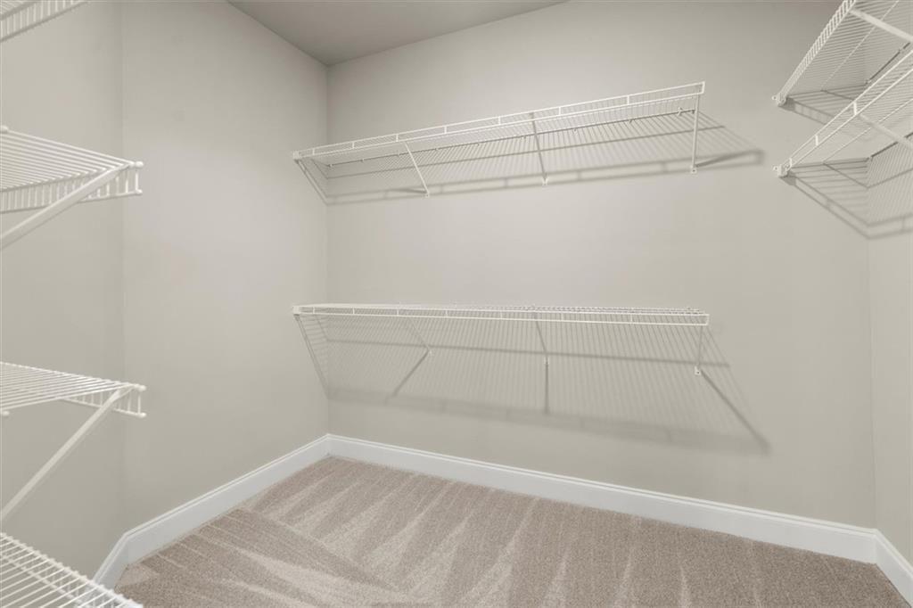 293 Thompson Street Alpharetta, GA 30009 - Photo 37 of 71 a view of a room with racks on the wall