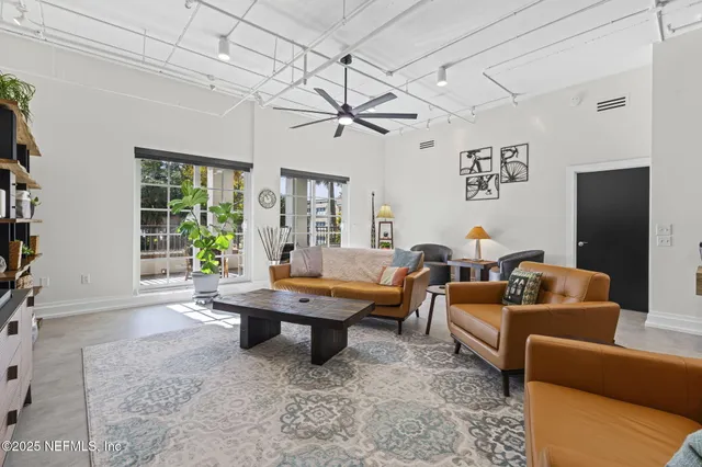 a dining room with a table chairs and a dining table