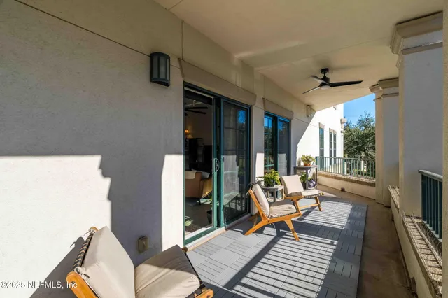 a bedroom with a bed dresser and a window
