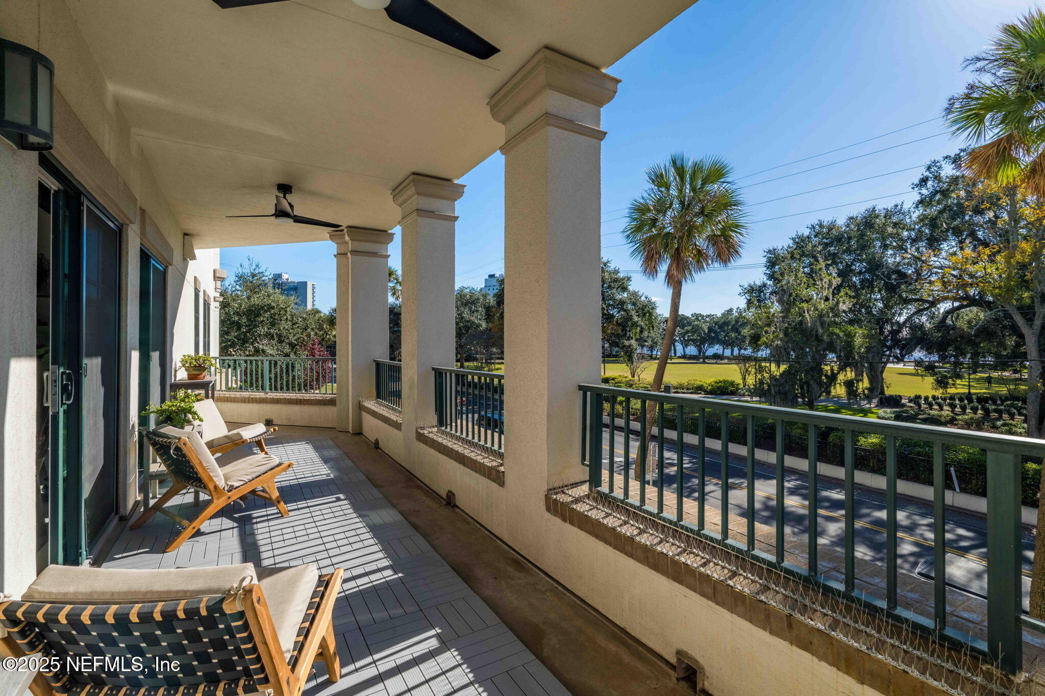 1661 Riverside Avenue, Unit 214 Jacksonville, FL 32204 - Photo 26 of 96 a view of balcony with wooden floor and outdoor seating