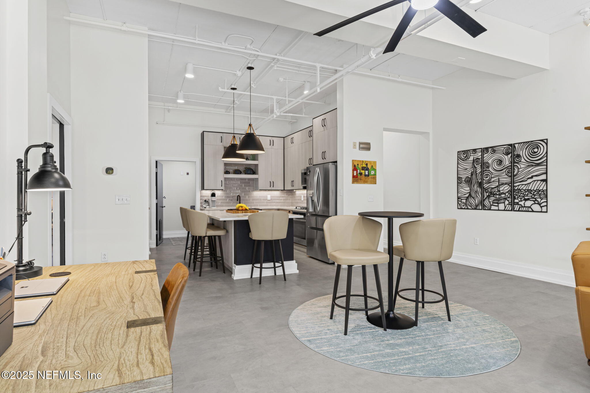 1661 Riverside Avenue, Unit 214 Jacksonville, FL 32204 - Photo 30 of 96 a dining room with a table chairs and a dining table