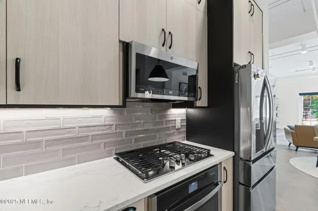 a view of a balcony with furniture