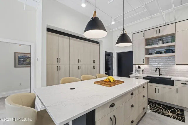 a view of a dinning table and chairs in the patio