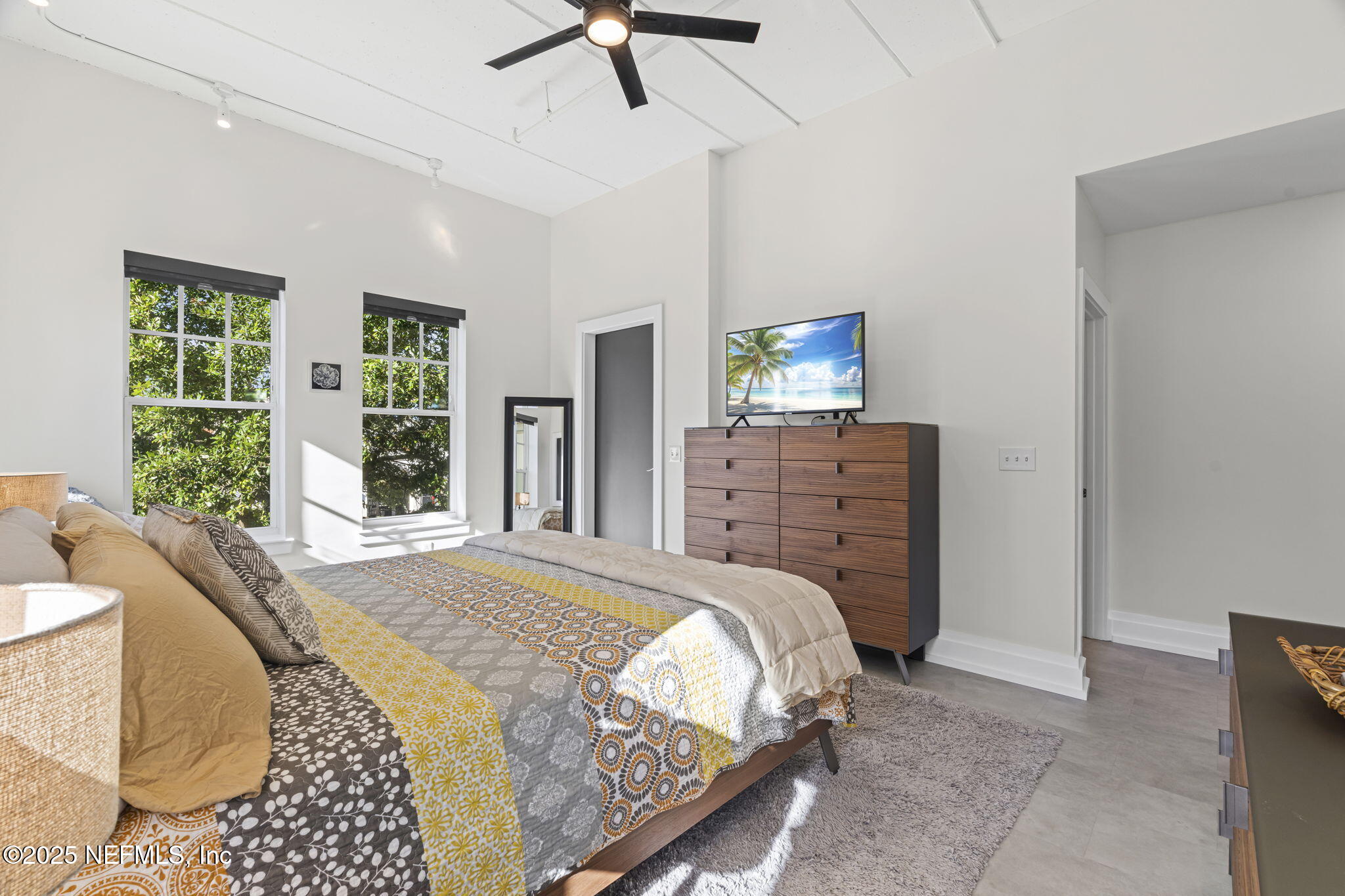 1661 Riverside Avenue, Unit 214 Jacksonville, FL 32204 - Photo 40 of 96 a bedroom with a bed dresser and a window