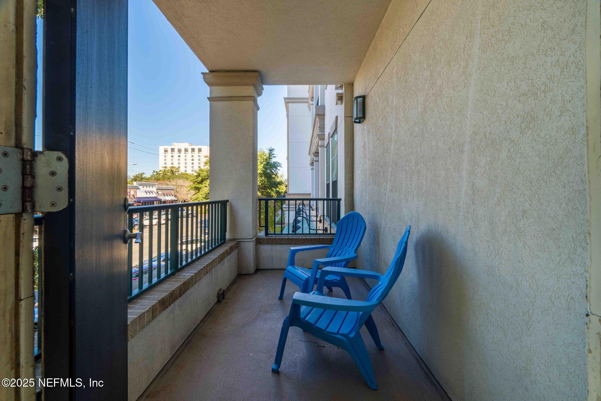 1661 Riverside Avenue, Unit 214 Jacksonville, FL 32204 - Photo 43 of 96 a view of a porch with furniture and front door