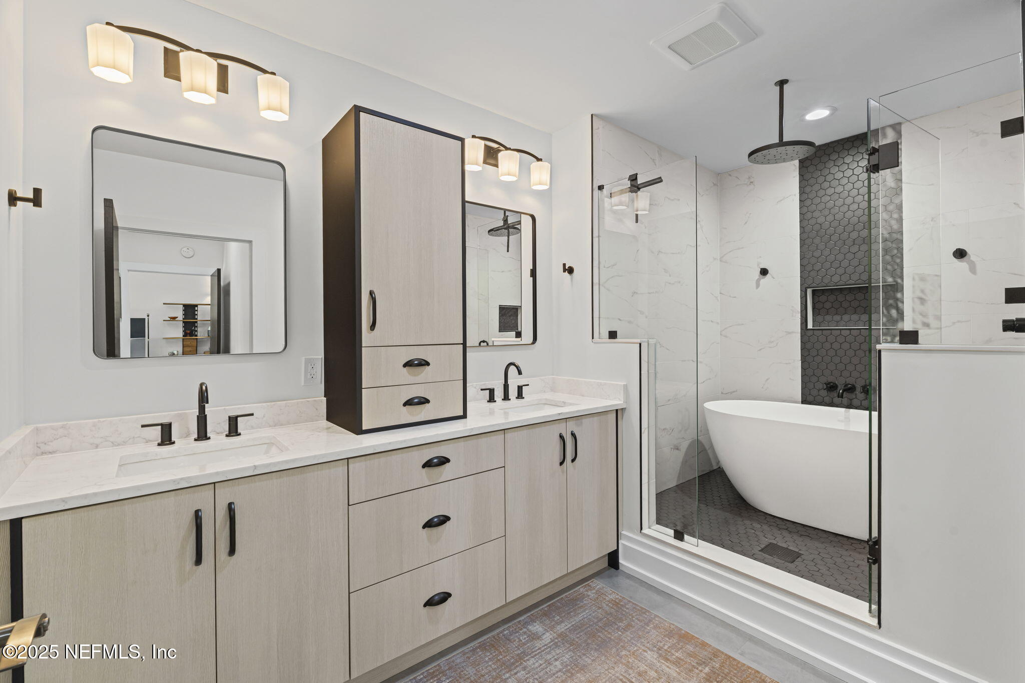 1661 Riverside Avenue, Unit 214 Jacksonville, FL 32204 - Photo 48 of 96 a bathroom with a double vanity sink mirror and bathtub