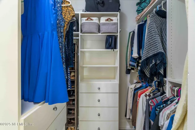 a view of a lake with a building in the background