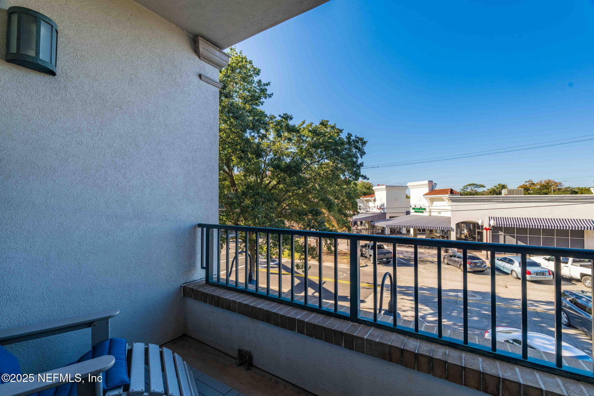 1661 Riverside Avenue, Unit 214 Jacksonville, FL 32204 - Photo 54 of 96 a view of a balcony with chairs