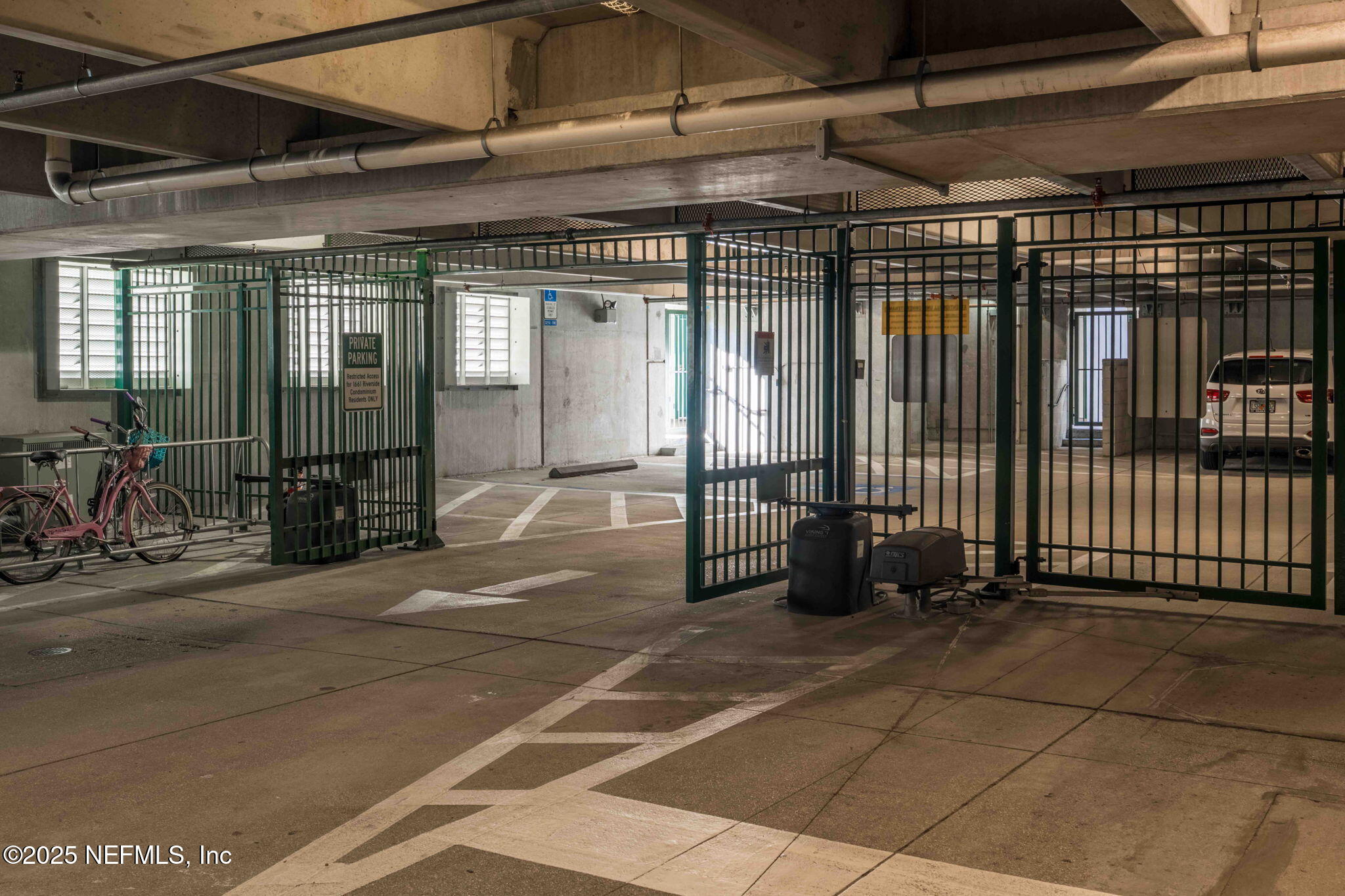1661 Riverside Avenue, Unit 214 Jacksonville, FL 32204 - Photo 79 of 96 a view of a hall with wooden floor
