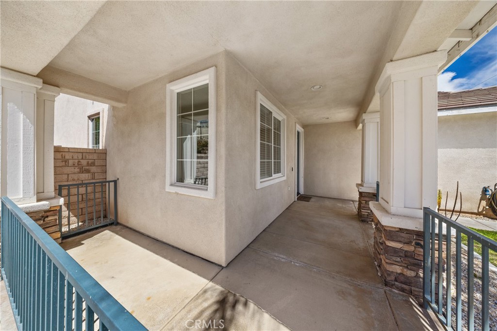 31207 Bell Mountain Road Menifee, CA 92584 - Photo 11 of 60 Covered Front Porch Entry With Private Sitting Area
