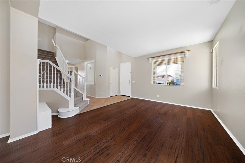 31207 Bell Mountain Road Menifee, CA 92584 - Photo 15 of 60 Light-Filled Formal Living Room With Wood Flooring