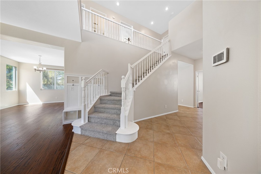 31207 Bell Mountain Road Menifee, CA 92584 - Photo 16 of 60 Grand Entry With High Ceilings And Elegant Staircase