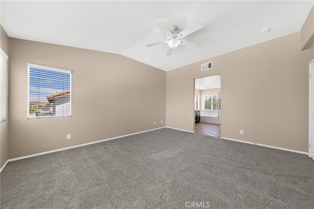 31207 Bell Mountain Road Menifee, CA 92584 - Photo 30 of 60 Spacious Primary Bedroom With Vaulted Ceilings And Natural Light