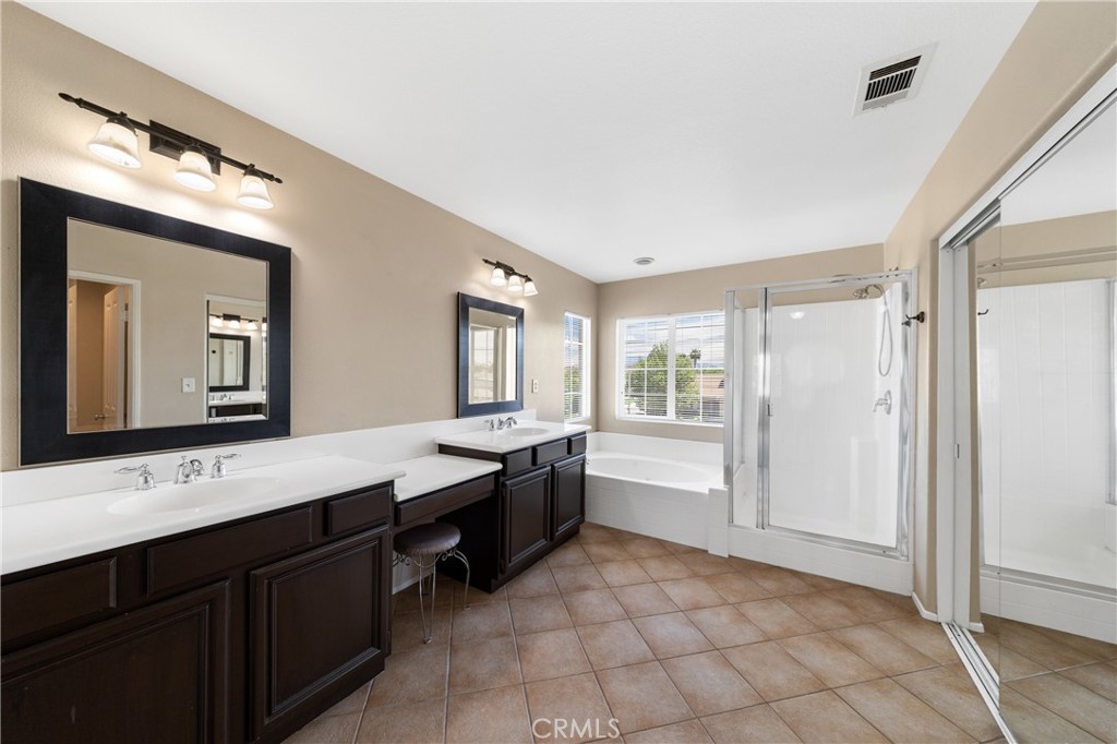 31207 Bell Mountain Road Menifee, CA 92584 - Photo 33 of 60 Expansive Primary Bathroom With Dual Vanities And Ample Storage