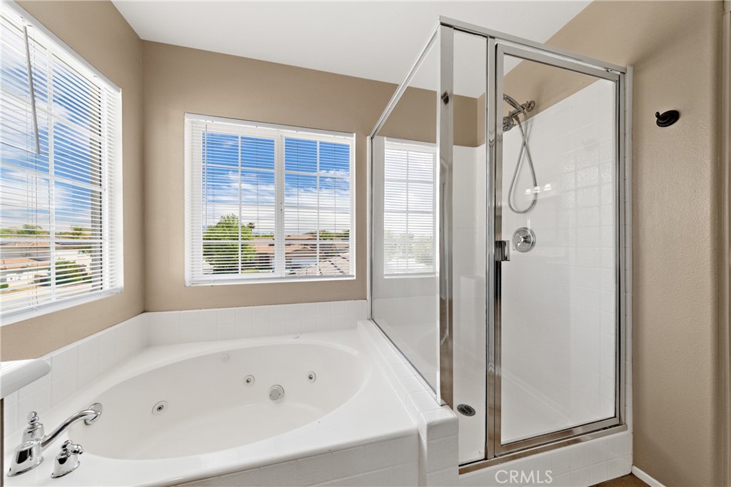 31207 Bell Mountain Road Menifee, CA 92584 - Photo 34 of 60 Primary Bathroom Featuring Soaking Tub And Separate Shower