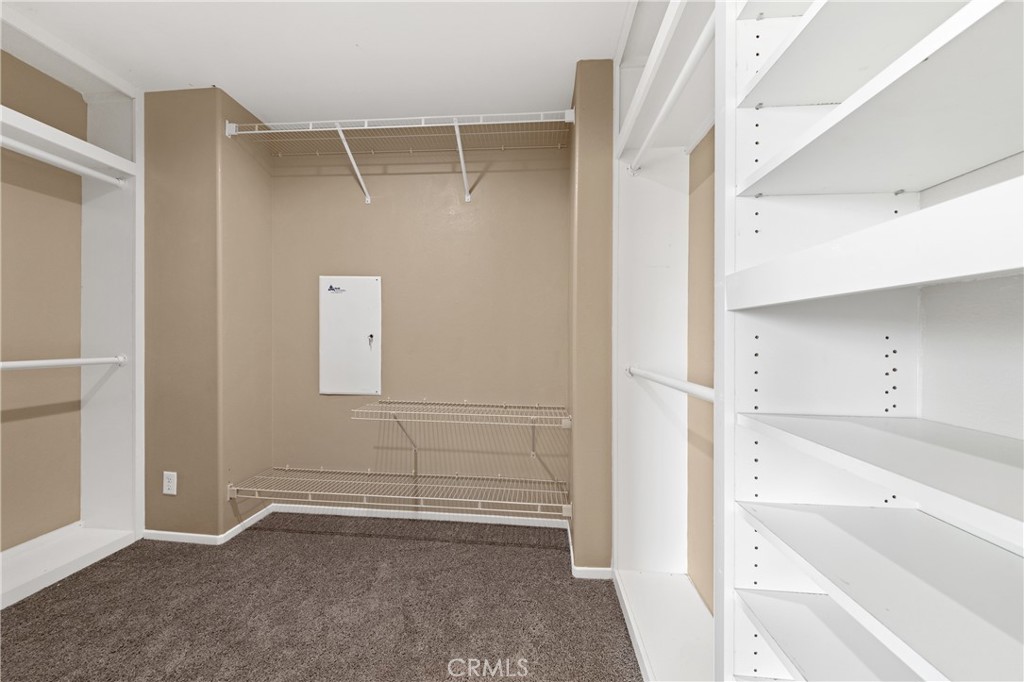 31207 Bell Mountain Road Menifee, CA 92584 - Photo 36 of 60 Walk-In Closet With Built-In Shelving And Organization