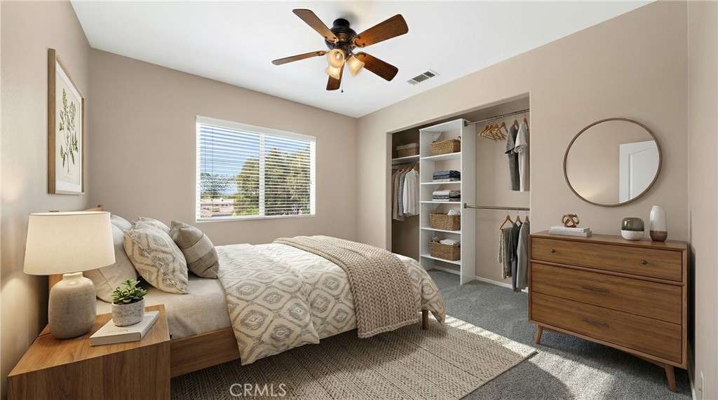 31207 Bell Mountain Road Menifee, CA 92584 - Photo 37 of 60 Secondary Bedroom With Ceiling Fan And Closet Storage - Digitally Staged