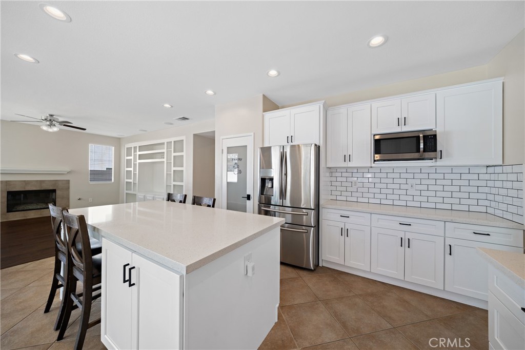 31207 Bell Mountain Road Menifee, CA 92584 - Photo 4 of 60 Gourmet Kitchen With Center Island And Modern Finishes