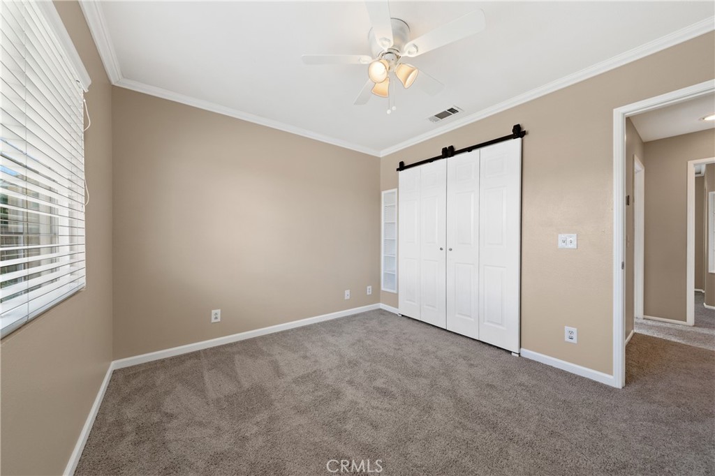 31207 Bell Mountain Road Menifee, CA 92584 - Photo 44 of 60 Bedroom With Barn Door Closet Feature