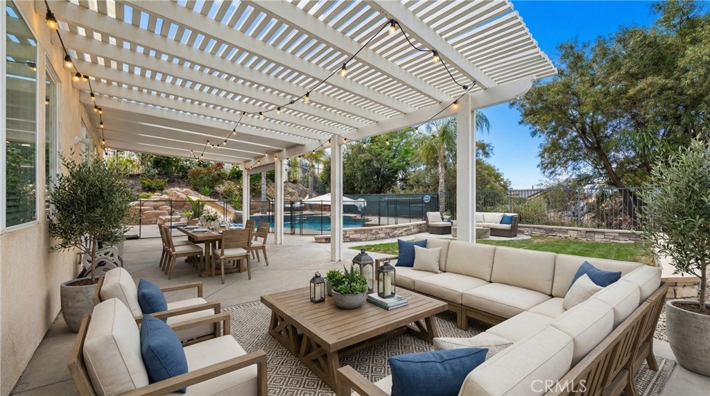 31207 Bell Mountain Road Menifee, CA 92584 - Photo 47 of 60 Covered Patio With Pergola And Outdoor Entertaining Space - Digitally Staged