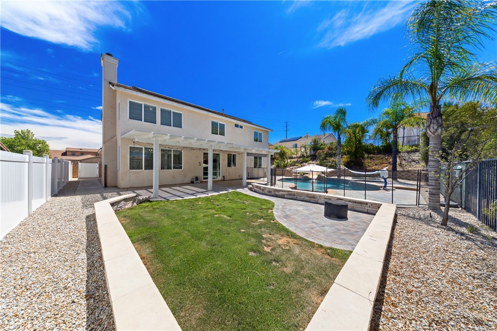 31207 Bell Mountain Road Menifee, CA 92584 - Photo 49 of 60 Backyard With Grass Area And Low Maintenance Landscaping