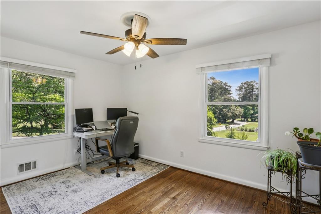 2740 Frontier Trail Atlanta, GA 30341 - Photo 20 of 29 a workspace with wooden floor and a window