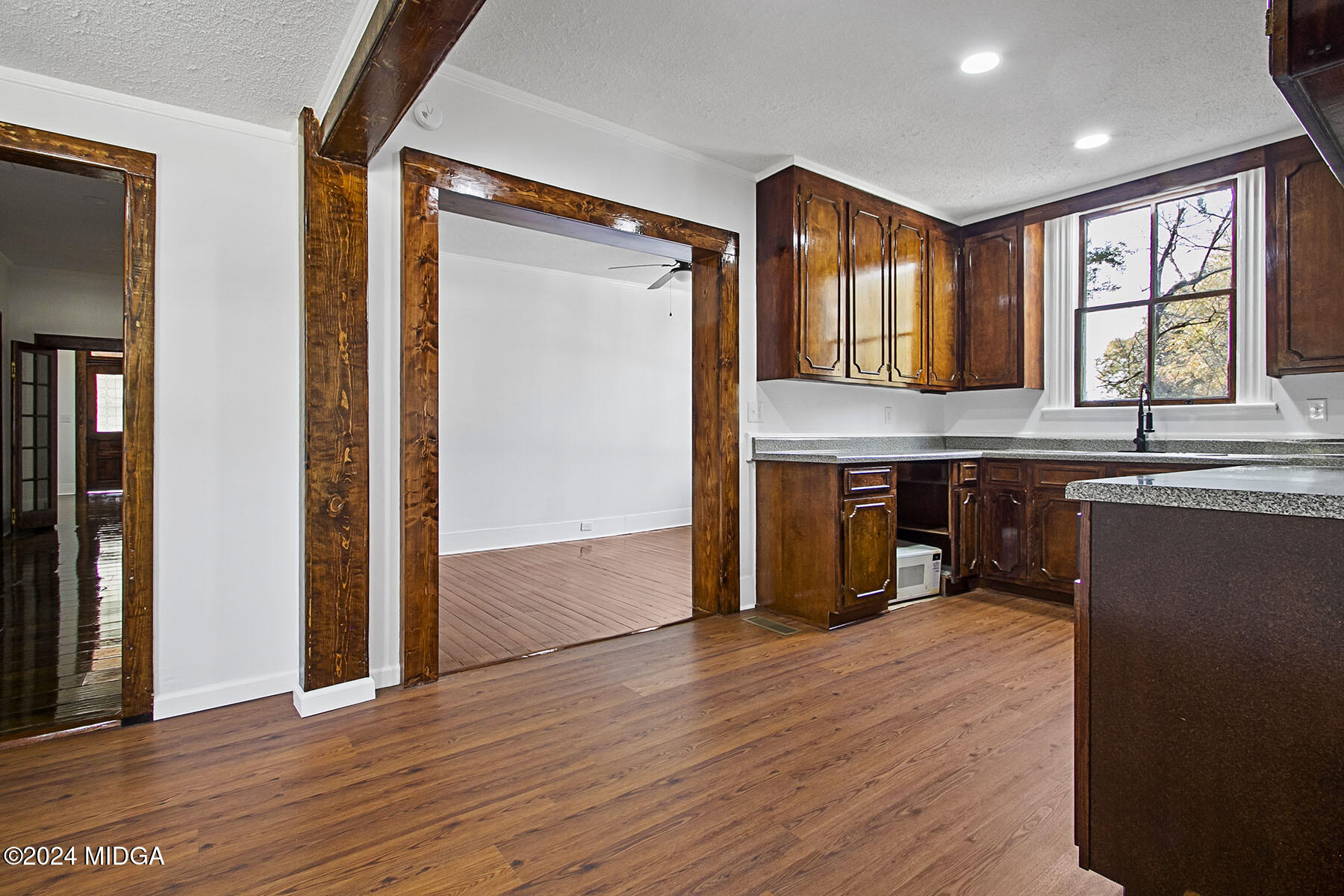 236 Old Clinton Road Gray, GA 31032 - Photo 16 of 27 a view of kitchen with furniture and wooden floor