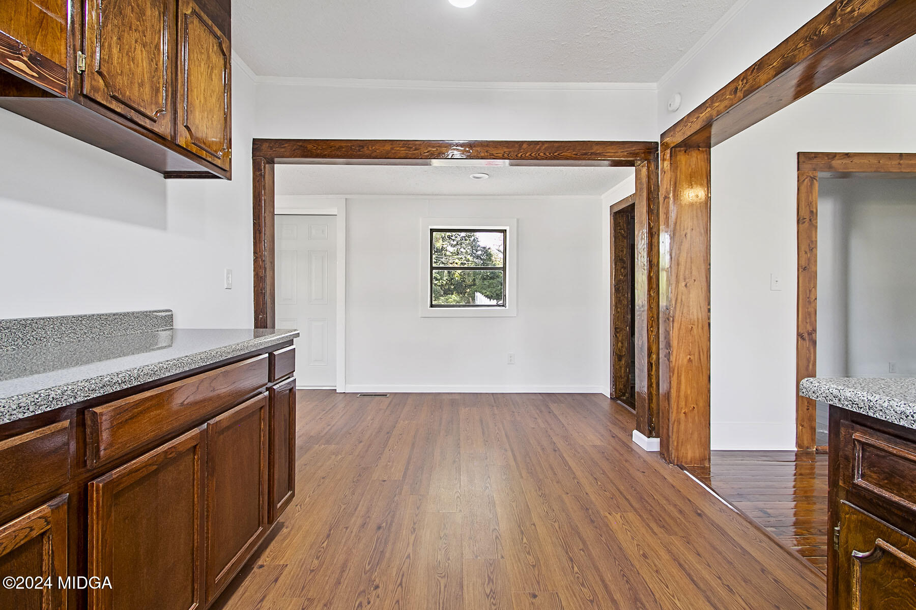 236 Old Clinton Road Gray, GA 31032 - Photo 18 of 27 a view of a kitchen with wooden floor and a window