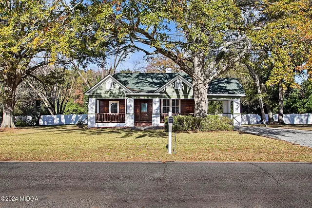 a view of a house with a swimming pool