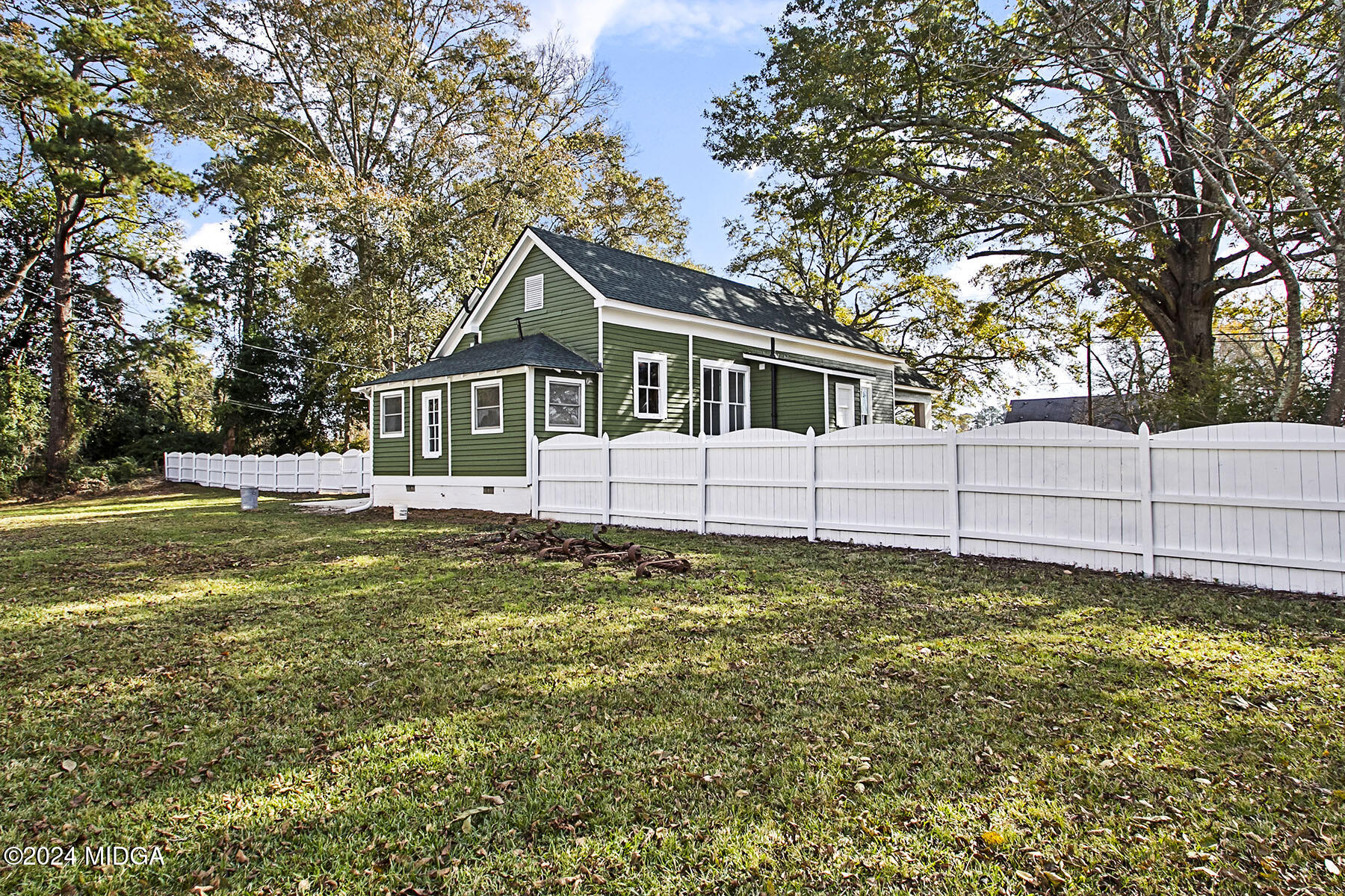 236 Old Clinton Road Gray, GA 31032 - Photo 25 of 27 a house with swimming pool in front of it