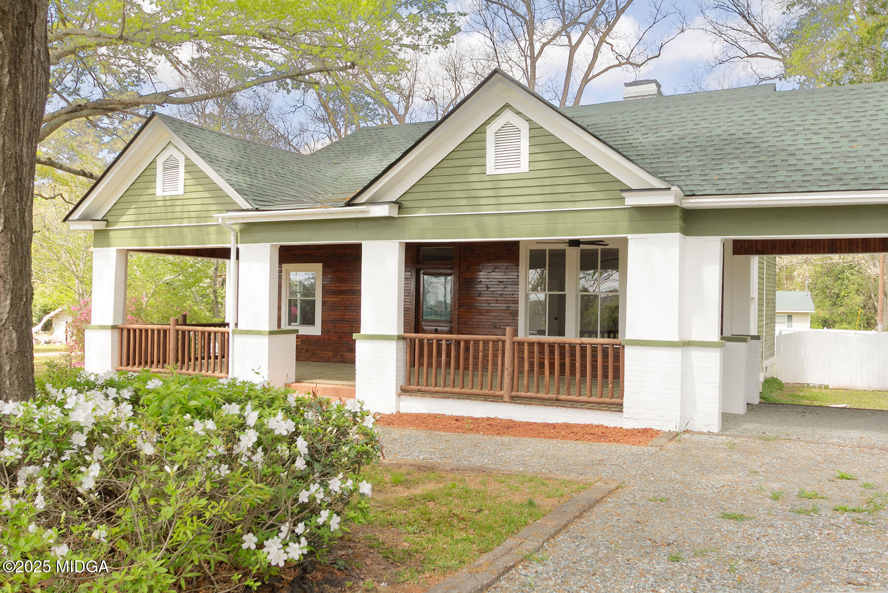 236 Old Clinton Road Gray, GA 31032 - Photo 27 of 27 a front view of a house with a garden