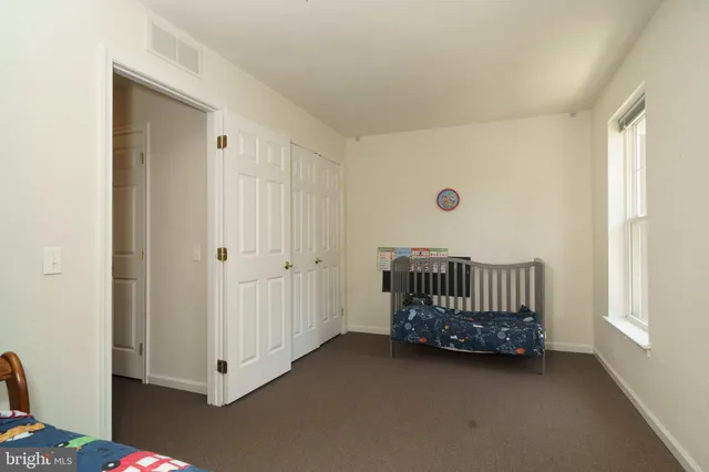 a view of a room with furniture window and a bathroom