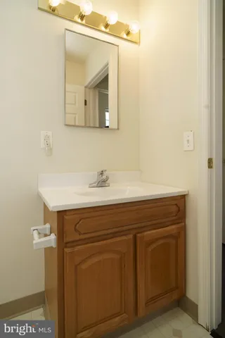 a sink with a mirror