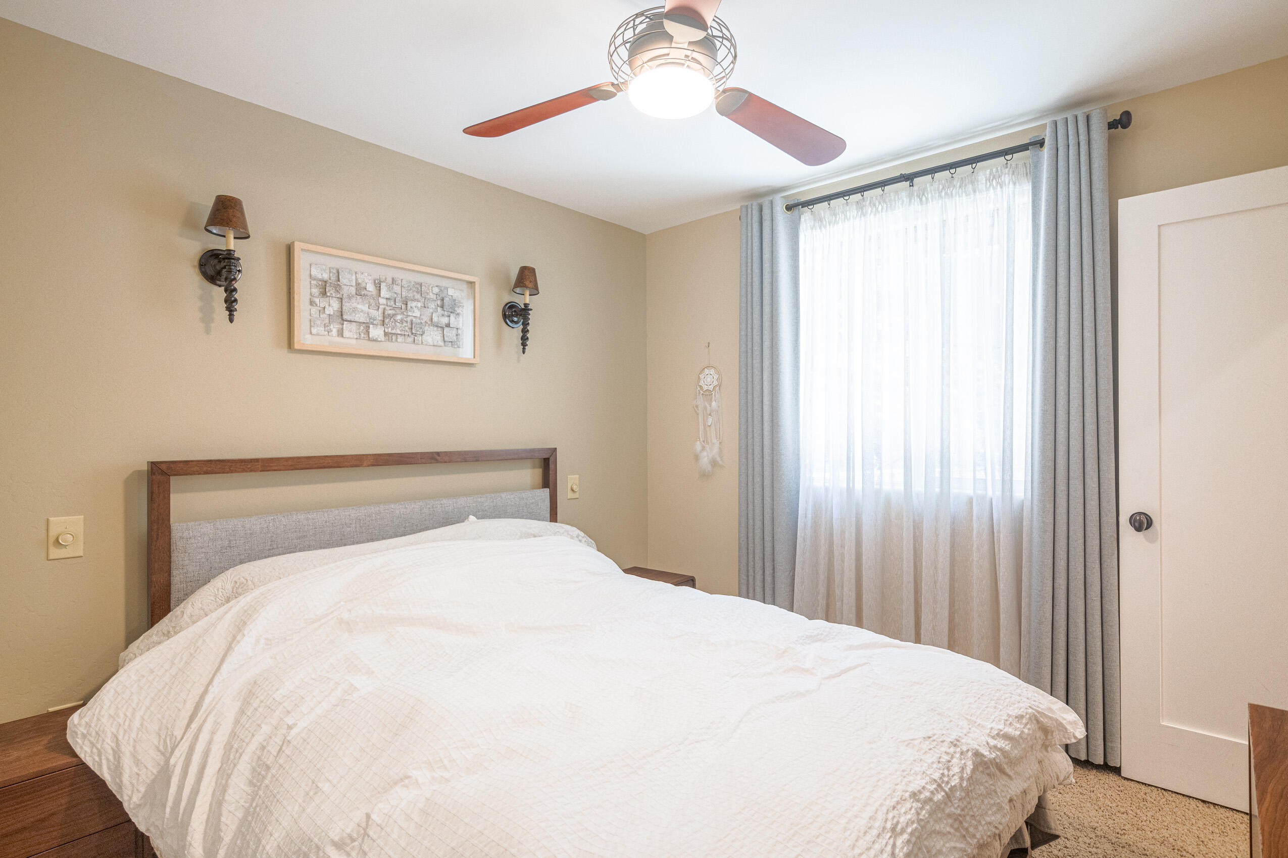 11809 Pine Drive Wofford Heights, CA 93285 - Photo 29 of 33 a large bed in a bedroom next to a window