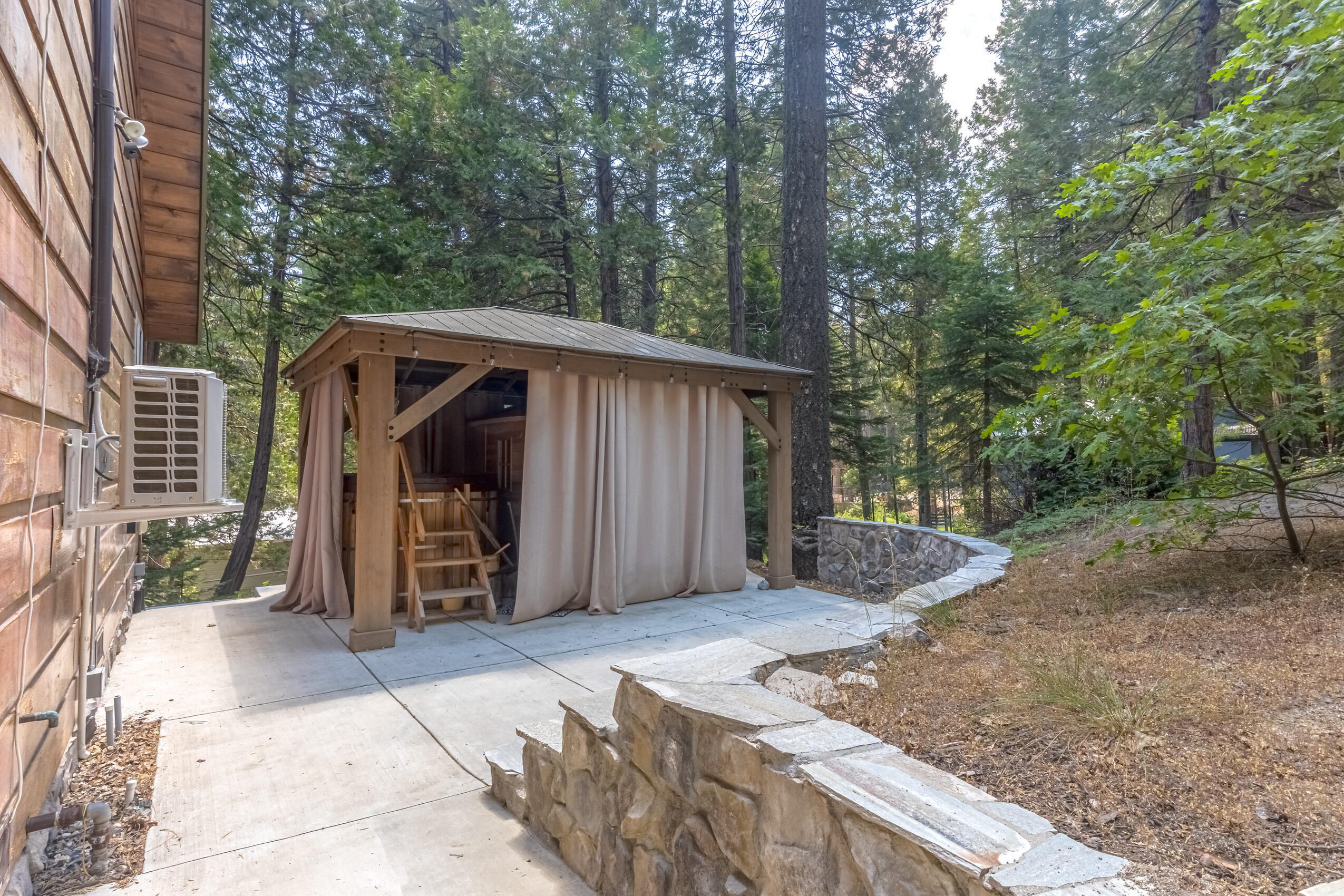 11809 Pine Drive Wofford Heights, CA 93285 - Photo 31 of 33 a front view of a house with garden