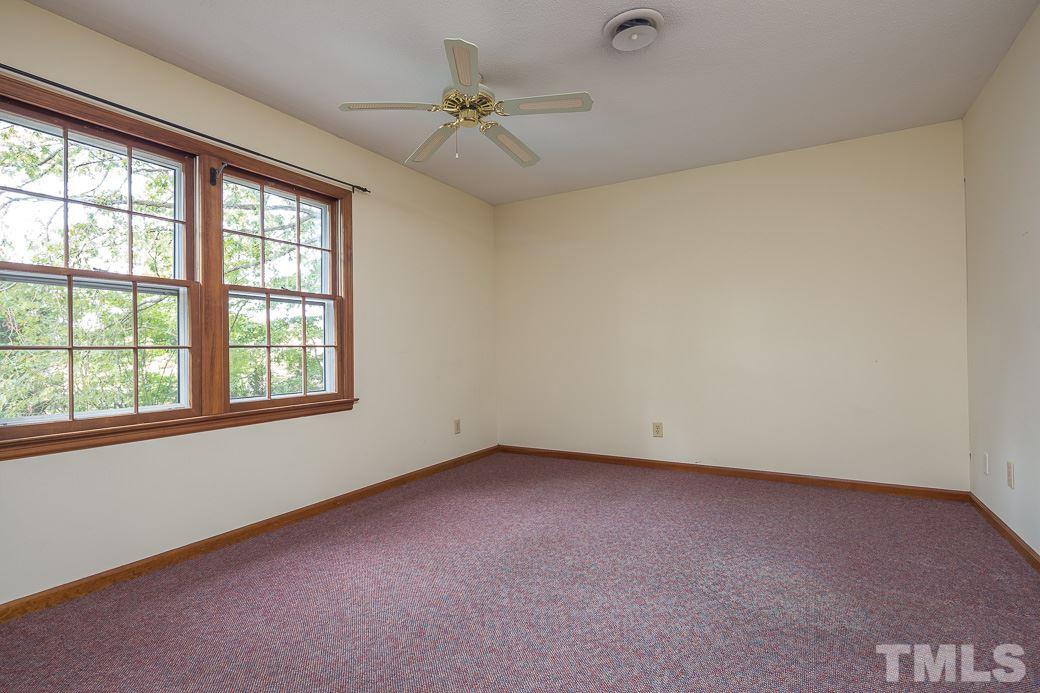 6700 Colony Court Raleigh, NC 27613 - Photo 12 of 21 Large windows give a great view of the pool & yard.