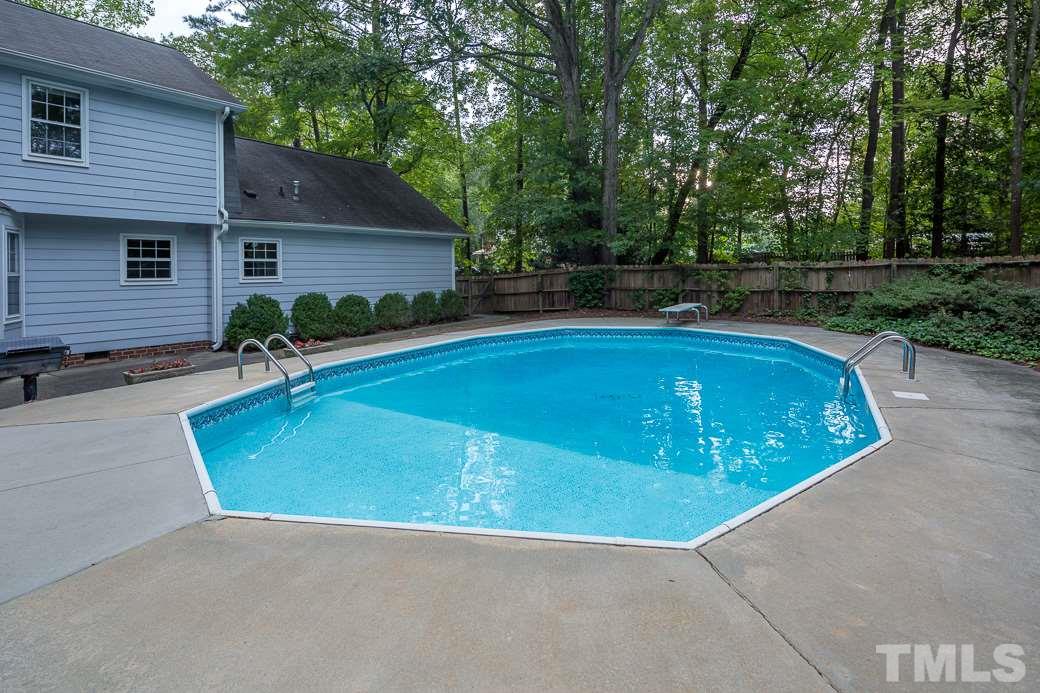 6700 Colony Court Raleigh, NC 27613 - Photo 17 of 21 Large fenced back yard, nicely landscaped with in-ground pool!