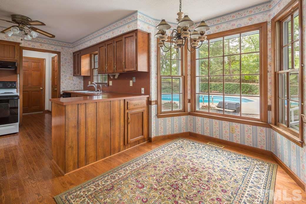 6700 Colony Court Raleigh, NC 27613 - Photo 4 of 21 Enjoy your breakfast with a pool view through the bay window!