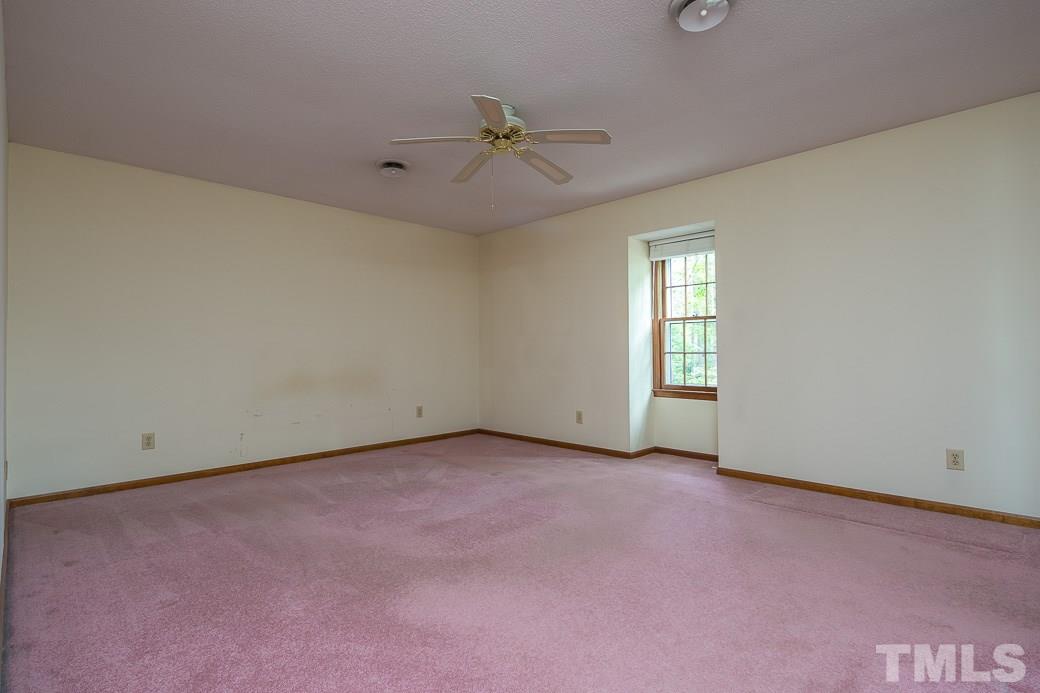 6700 Colony Court Raleigh, NC 27613 - Photo 8 of 21 Large master bedroom boasts walk-in closet with plenty of shelving!