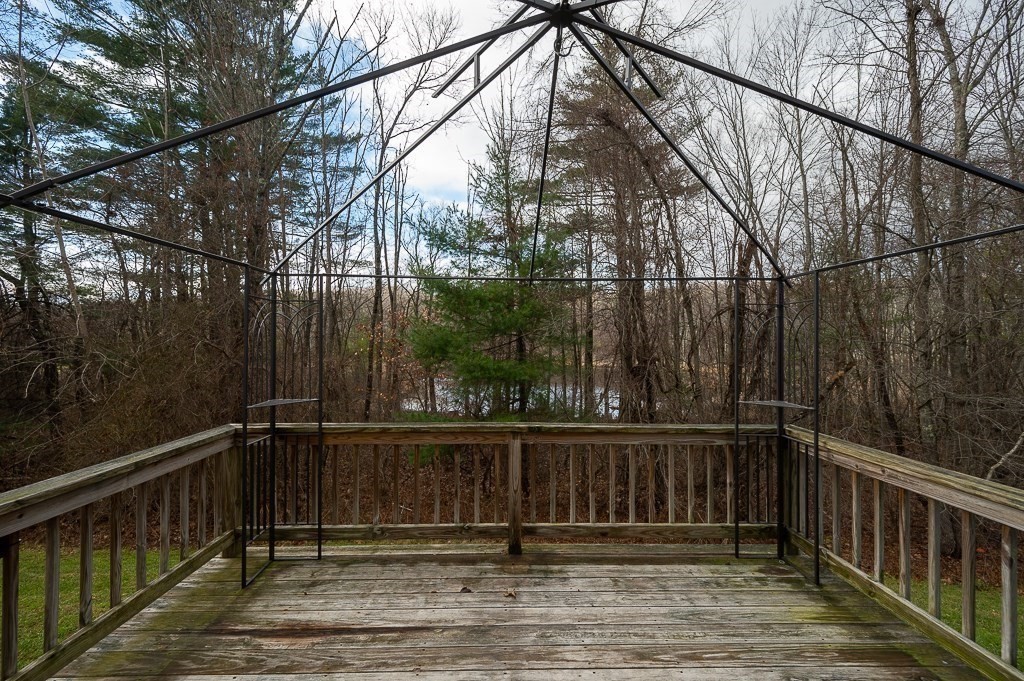 557 Cronin Road Warren, MA 01585 - Photo 22 of 28 a view of wooden balcony