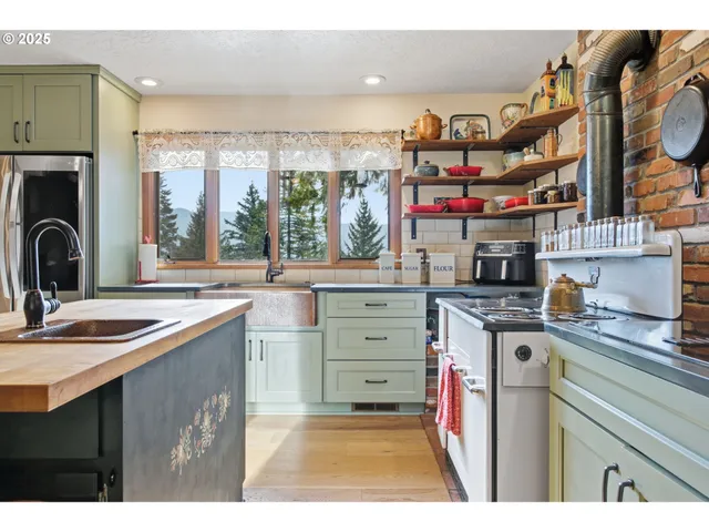 a kitchen with cabinets and sink