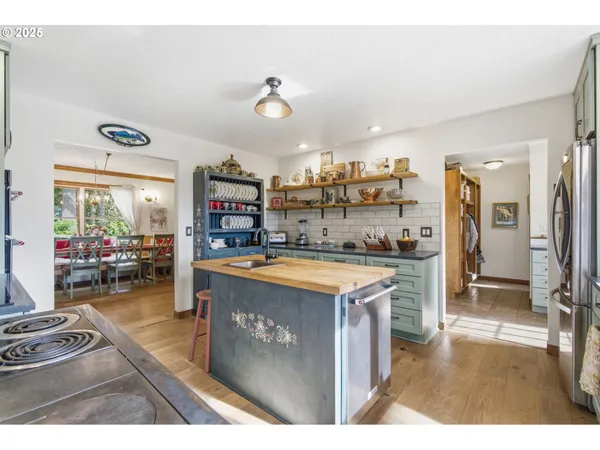 a kitchen with a cabinets and a stove