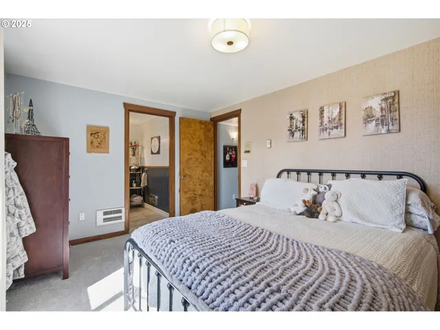 a bathroom with a shower and a sink