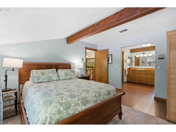 a bedroom with a bed and a cabinets