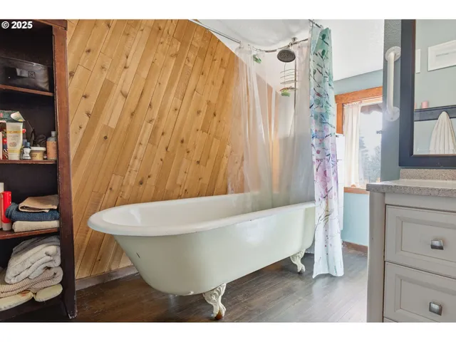 a room with furniture pool table furniture and windows