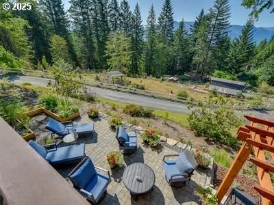 a patio with table and chairs