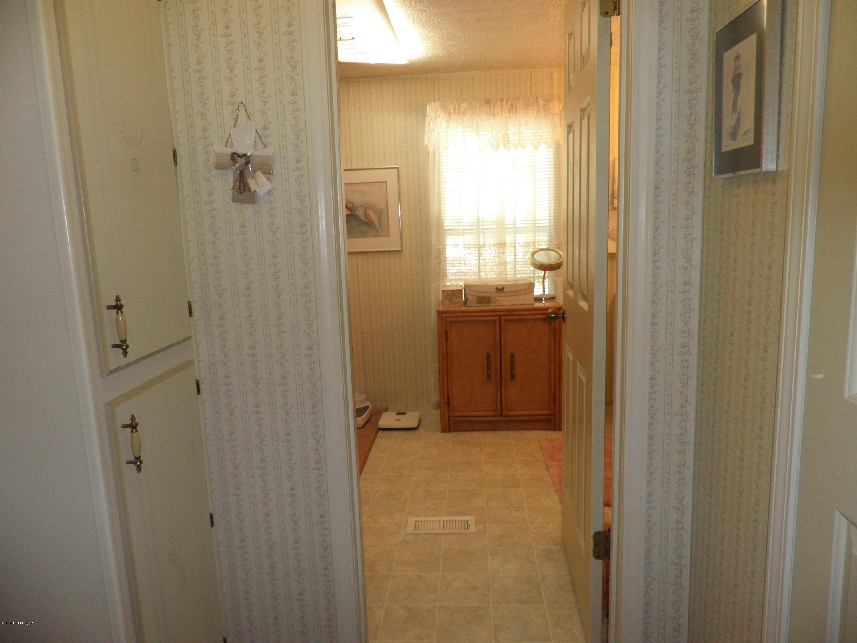 268 Beulah Church Road Welaka, FL 32112 - Photo 18 of 33 a bathroom with a shower